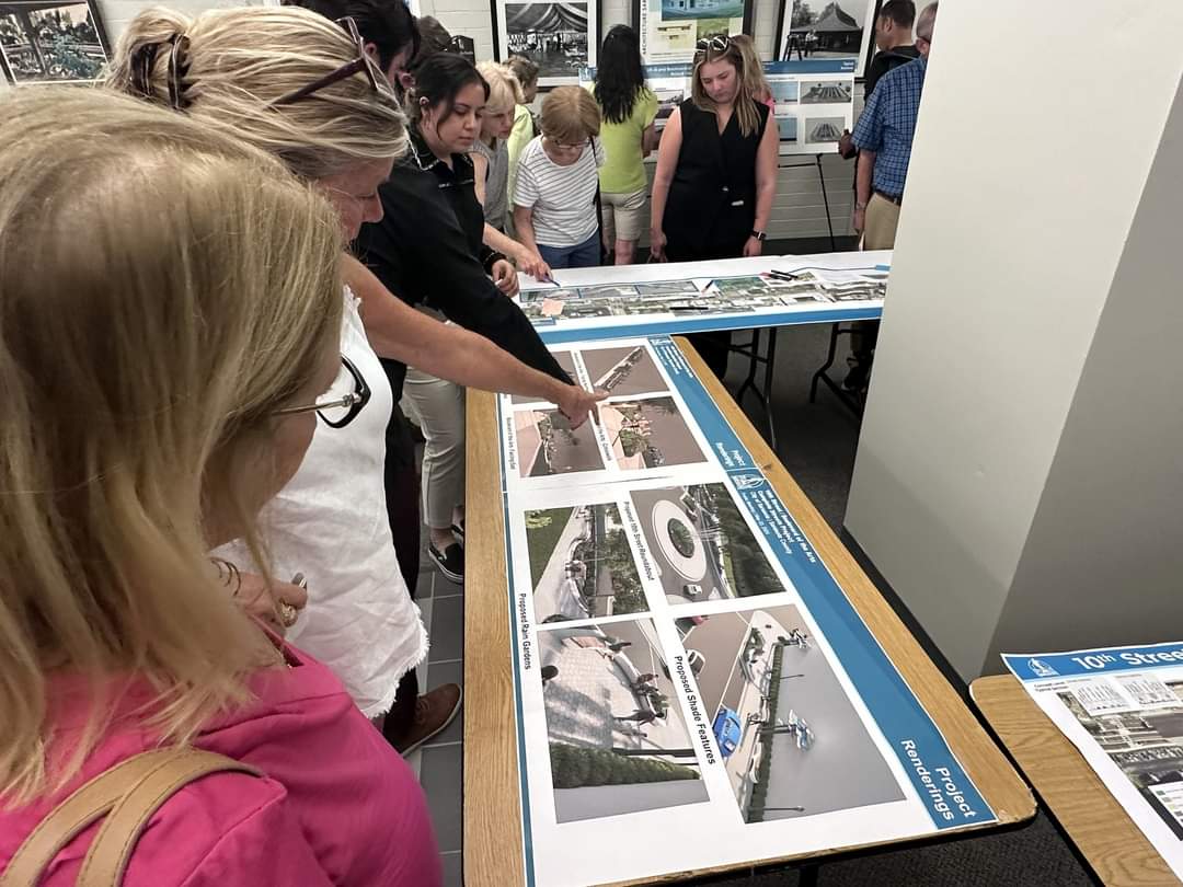 Attendee reviewing the renderings.